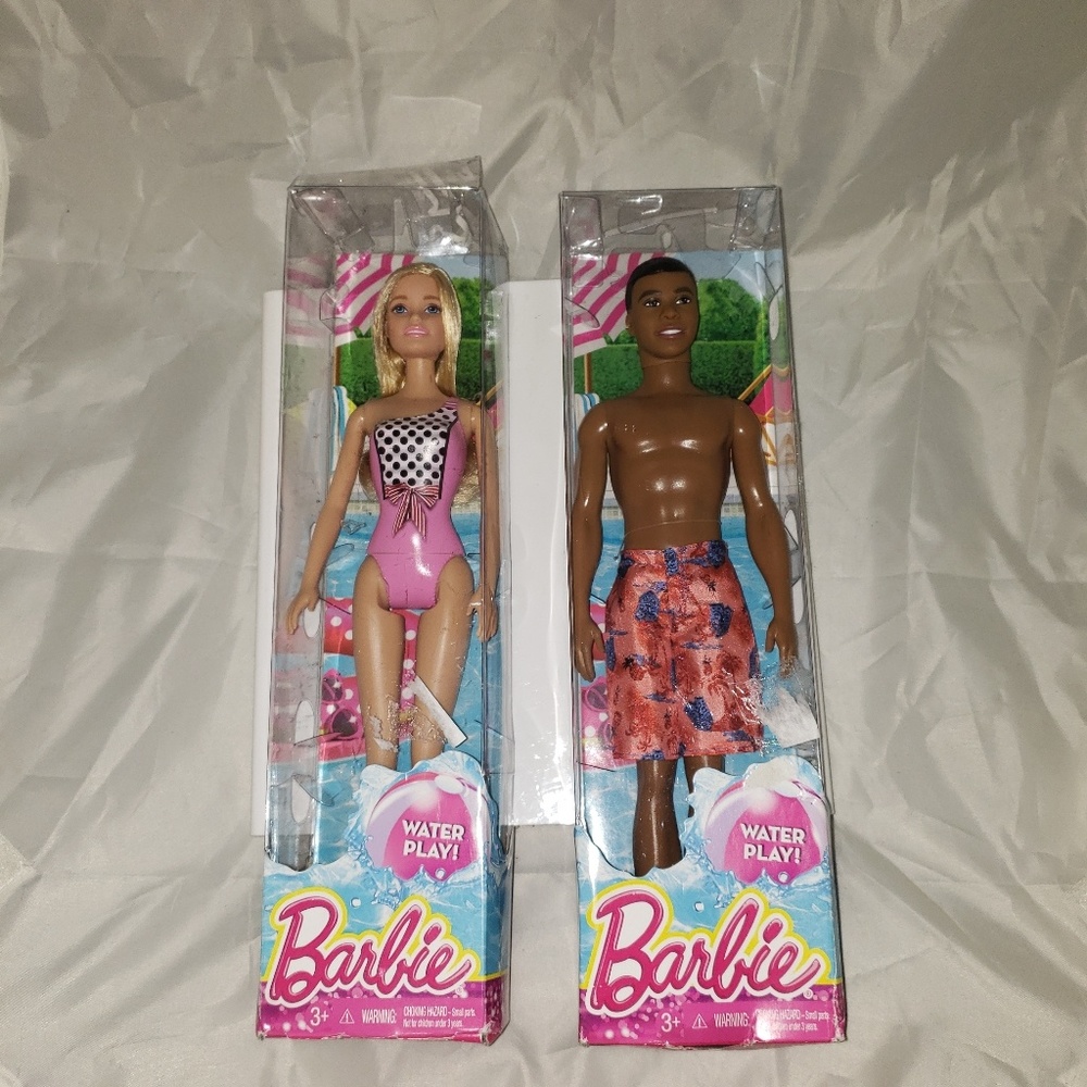 Water play barbie dolls by mattel